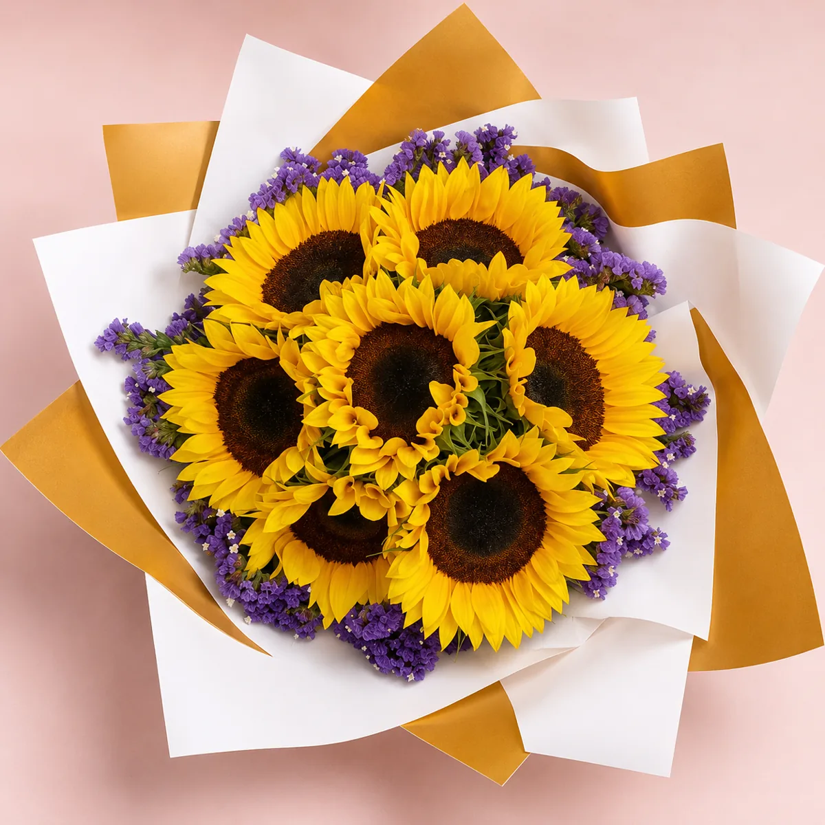 Ramo de siete girasoles con limonium